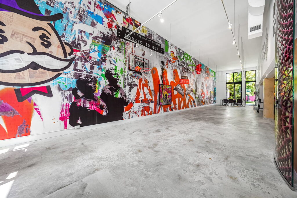 A long, narrow Miami loft is decorated with graffiti art