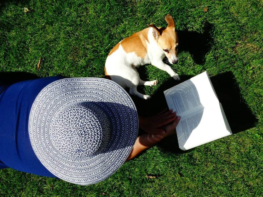 lady reading with dog