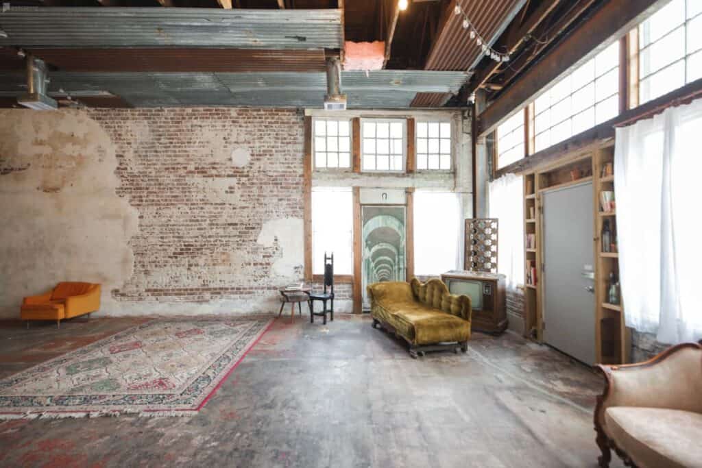 A rustic creative studio with exposed brick ideal for photoshoots in Houston