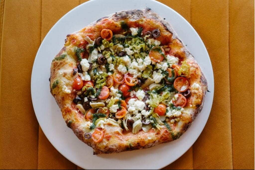 Overhead shot of a personal pizza at Hugo's Wood-Fired Kitchen in Des Moines