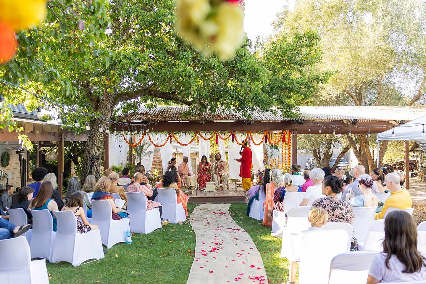 Outdoor Indian wedding ceremony setup with marigold decorations in New Jersey