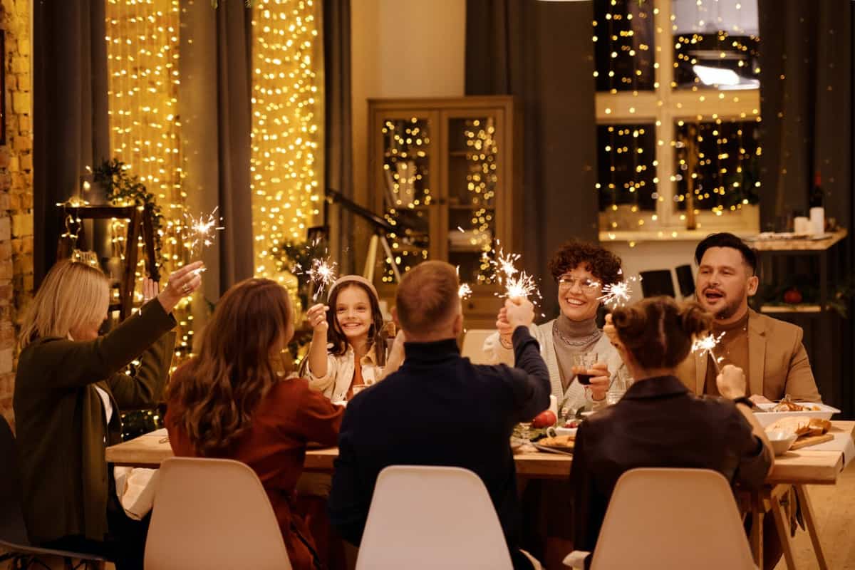 family sitting at holiday table