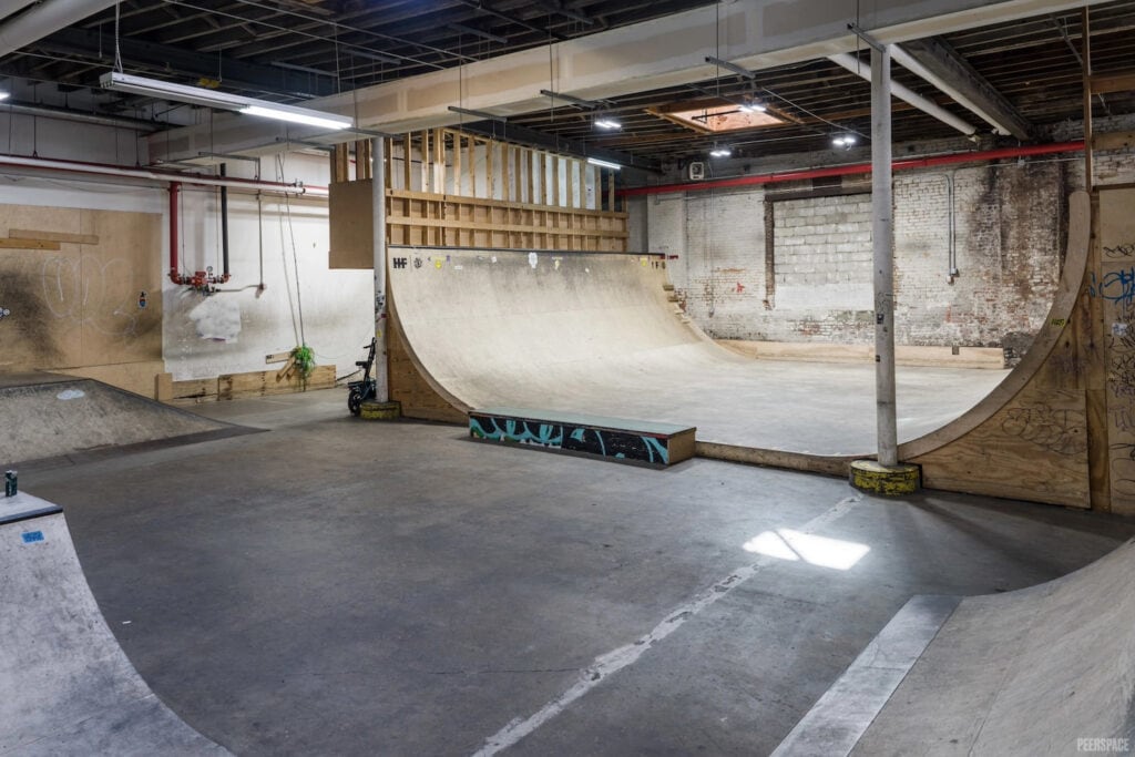 An indoor skate ramp at a warehouse event space
