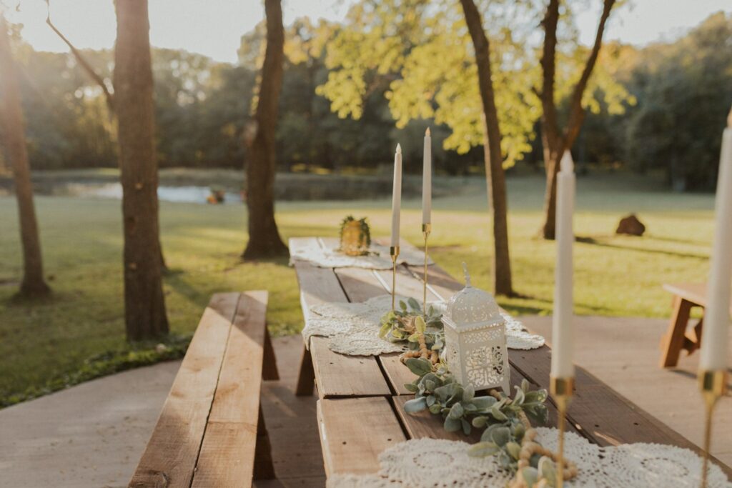 a decorated picnic table beside a pond