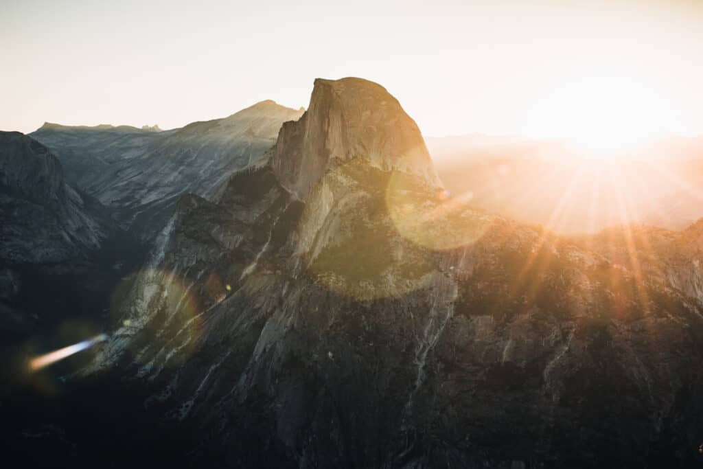 camera lens flare mountainside