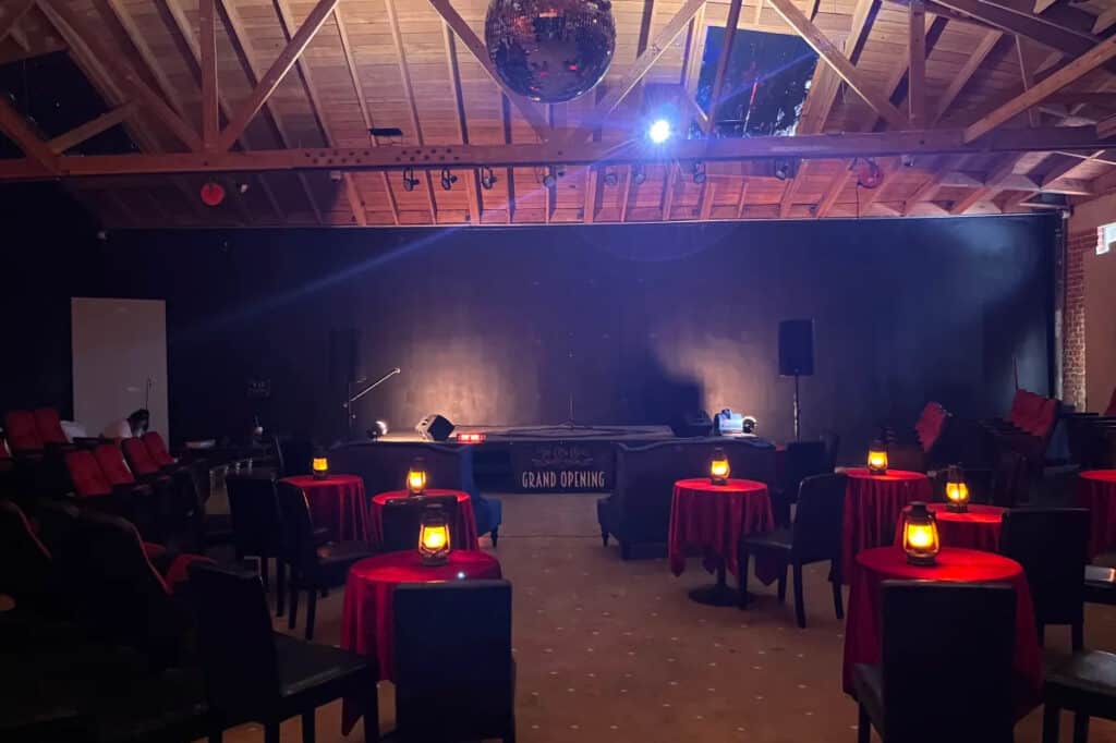 Gorgeous Theater Event Venue with Plush red seats and Stage | Skiptown Playhouse