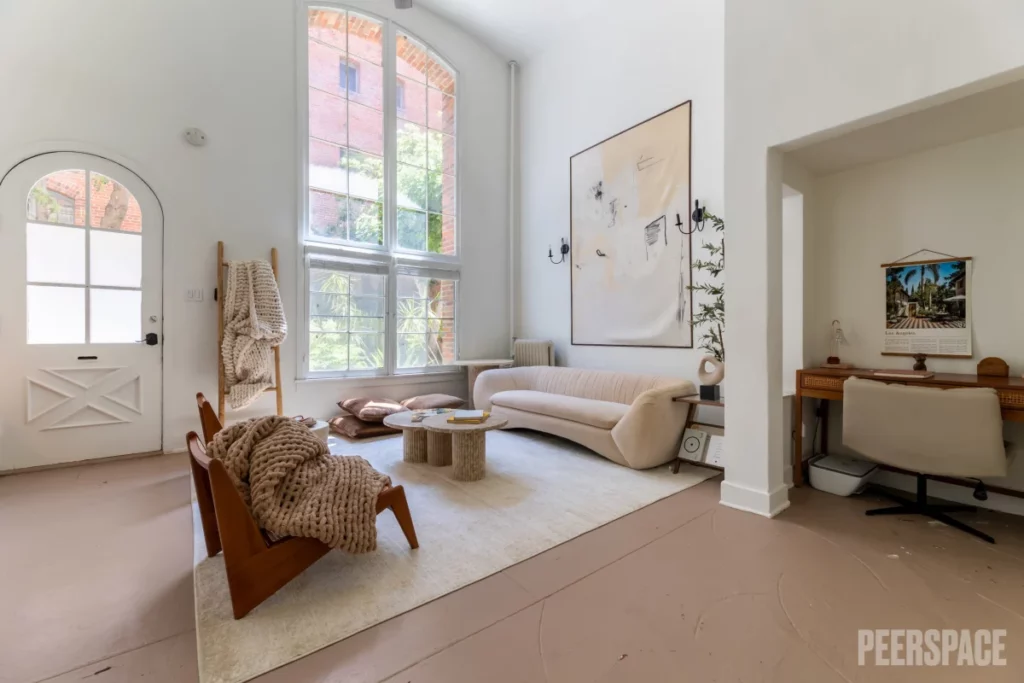 Minimalist Warm Tone Historic Loft with 30 ft Arched Windows