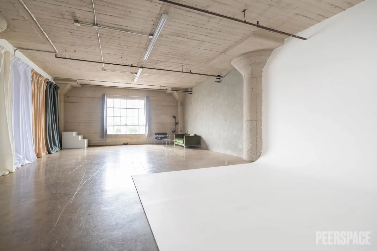 Natural Light Studio with Cyc Wall, Cement Style Wall, Equipment