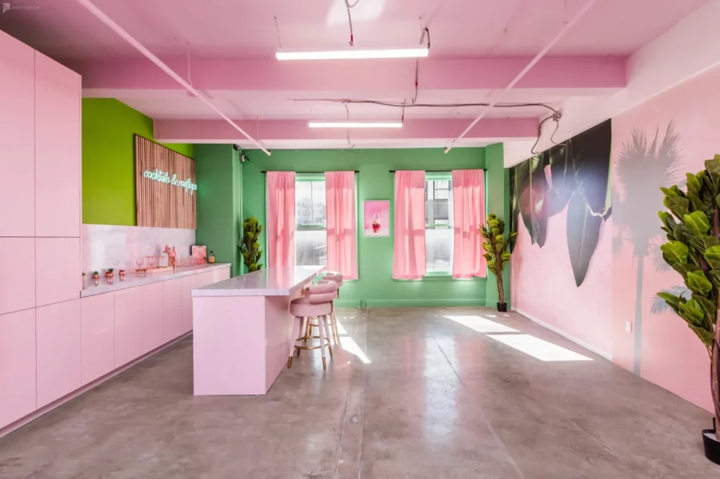 a pink and green palm springs-inspired studio