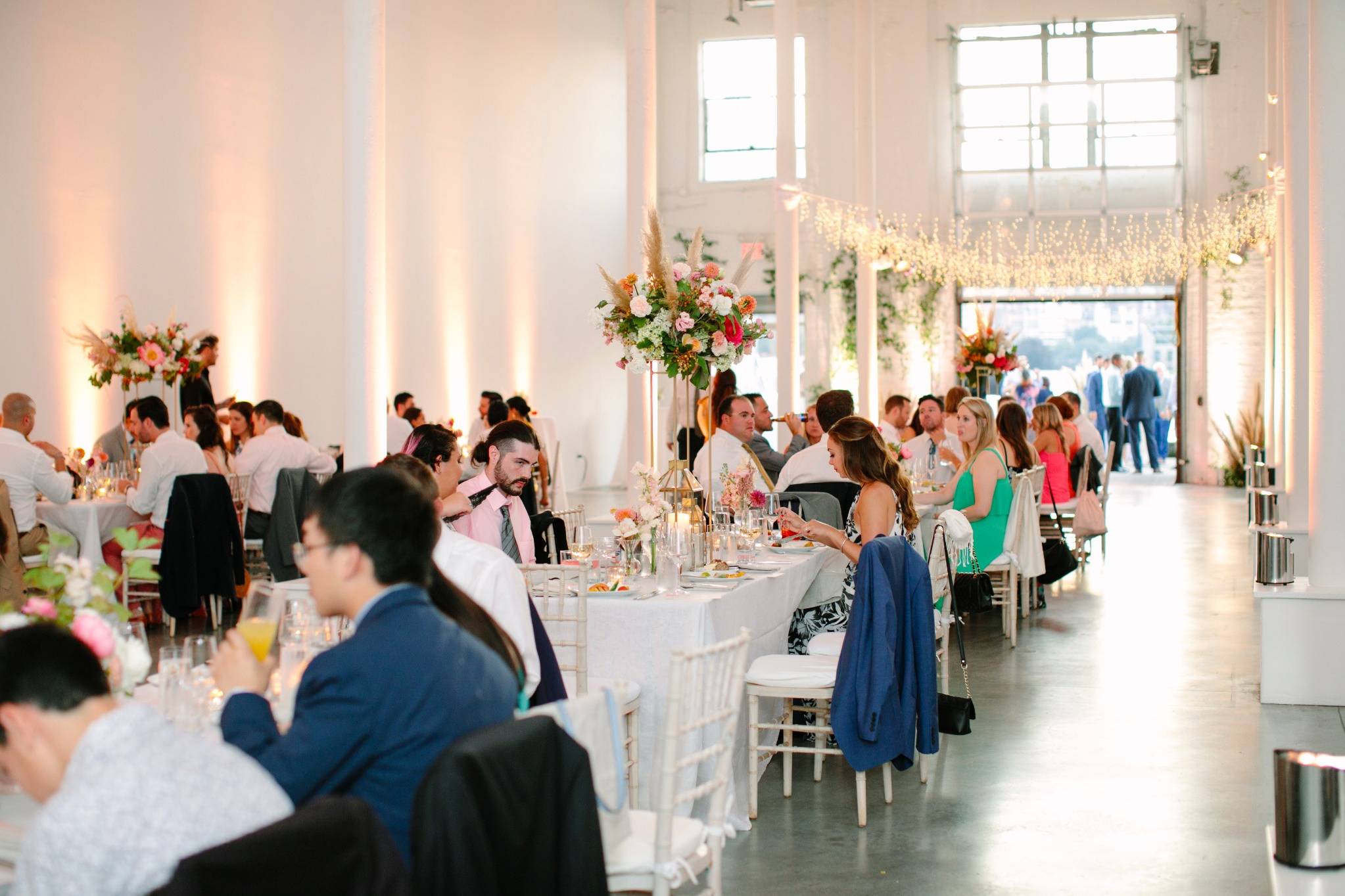 Newlyweds celebrating at a luxury Michigan wedding venue at dusk