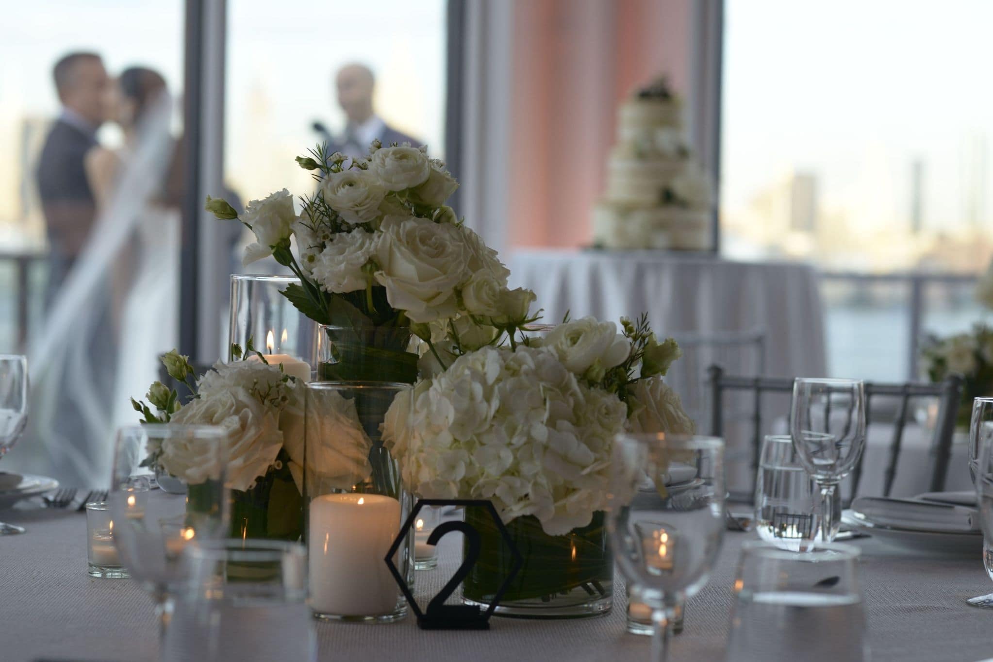 Luxury wedding reception centerpieces with New York city skyline view