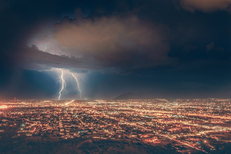 lightning over cityscape