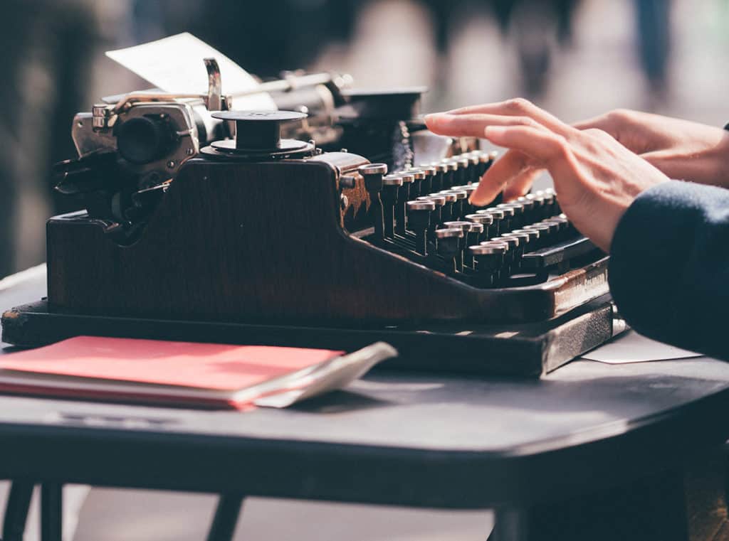 writing on typewriter