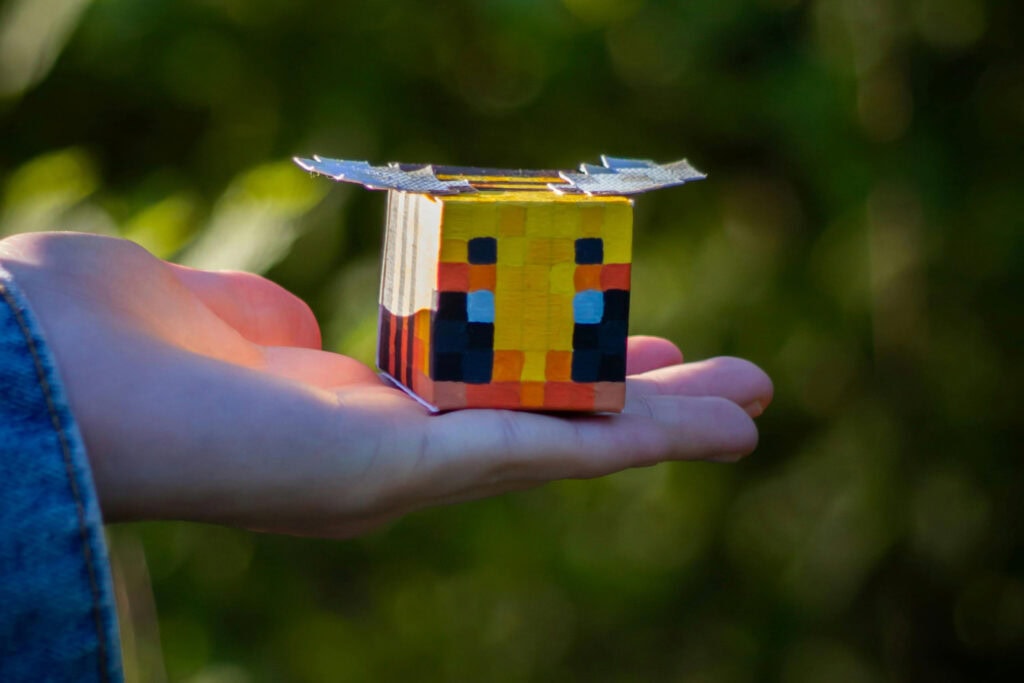 Hand holding homemade Minecraft figure