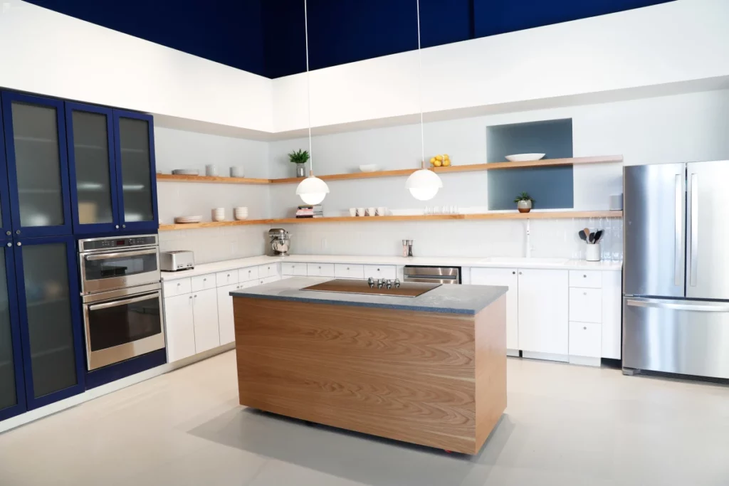 a blue and white demo kitchen 