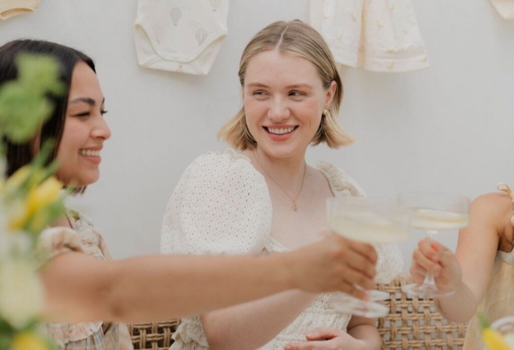 neutral baby shower with mom and two guests
