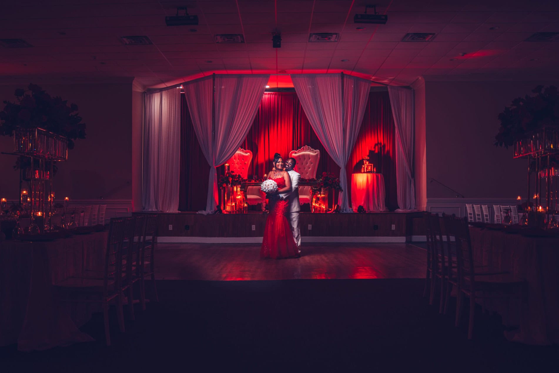 Colorful Nigerian wedding celebration in Houston with guests in aso ebi