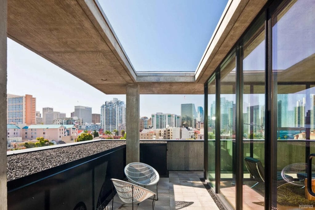 Concrete patio overlooks the city