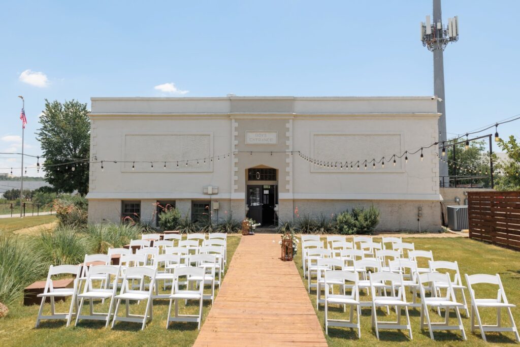 an outdoor venue configured for a wedding