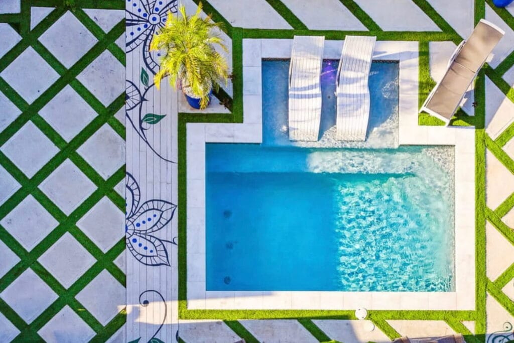 An overhead shot of a small plunge pool in the sunshine of New Orleans