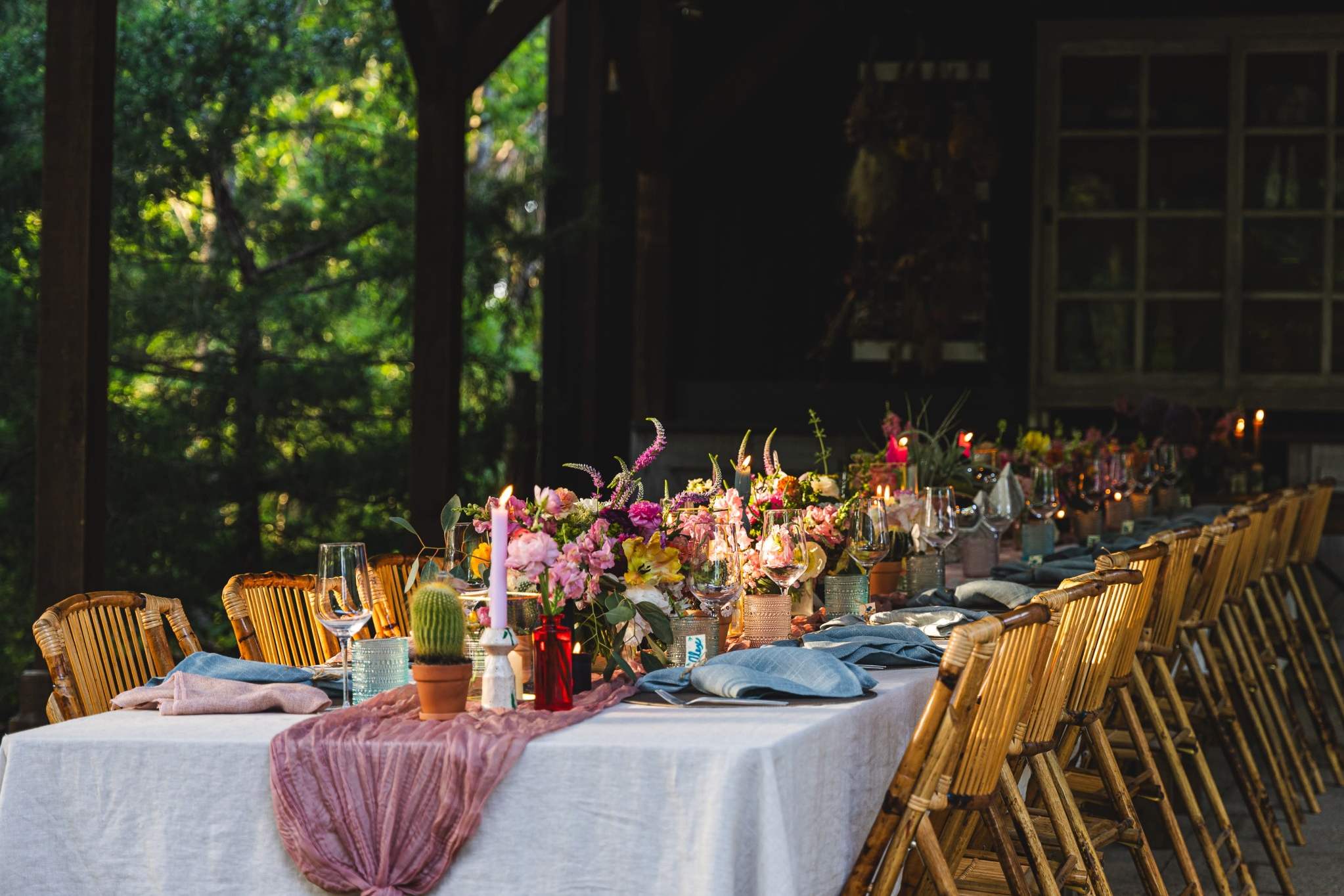 Elegant outdoor dining table setup with floral centerpieces for Atlanta parties