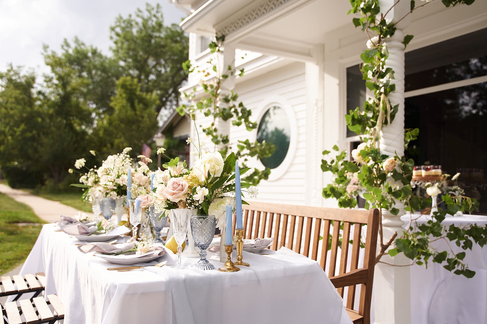 Upscale outdoor porch tablescape styled by Baton Rouge party planners