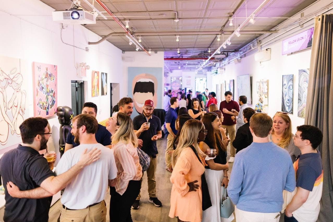 Creative art-gallery style Brooklyn event with purple ambient lighting