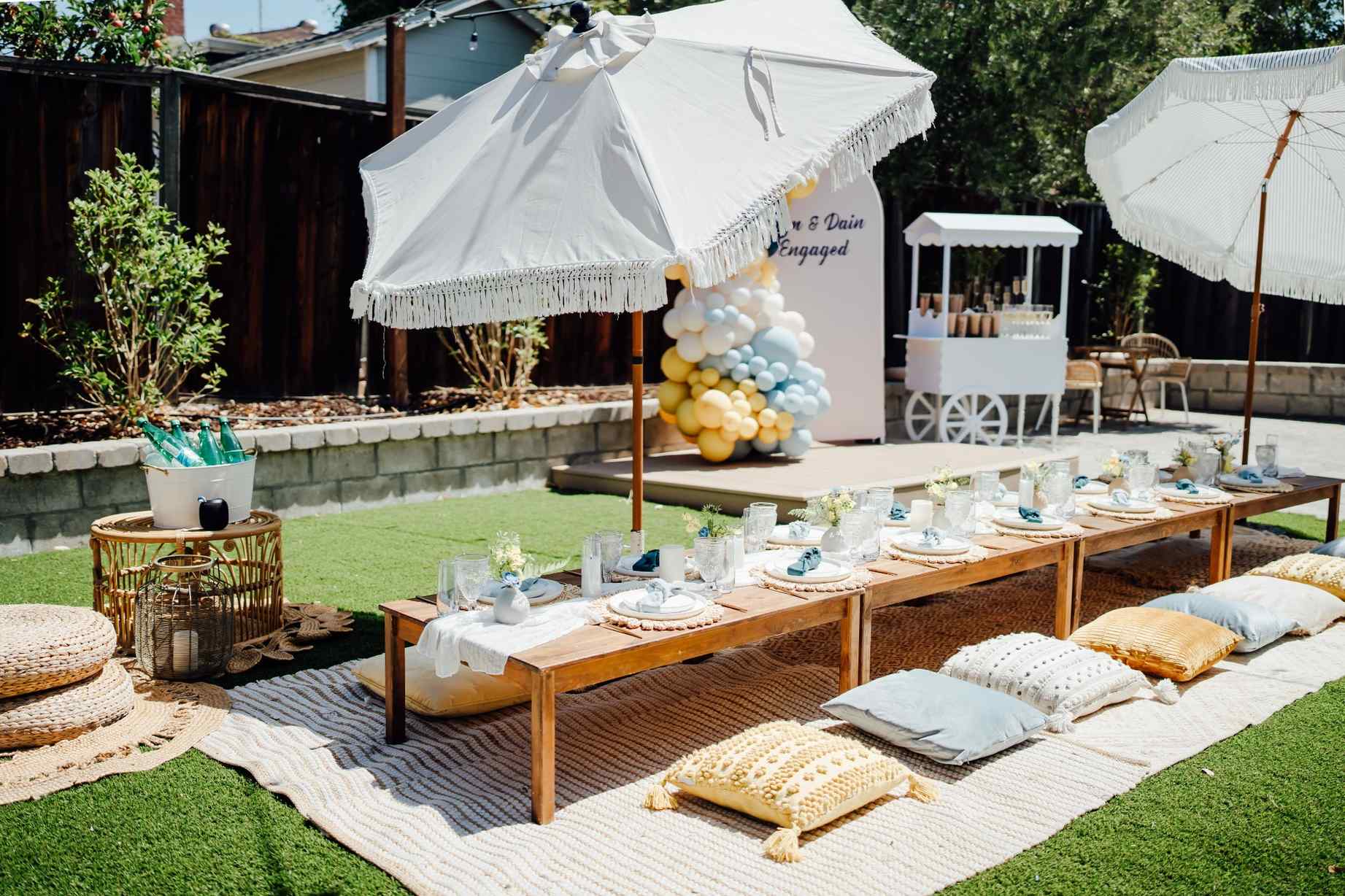Intimate backyard engagement party setup by Houston party planners