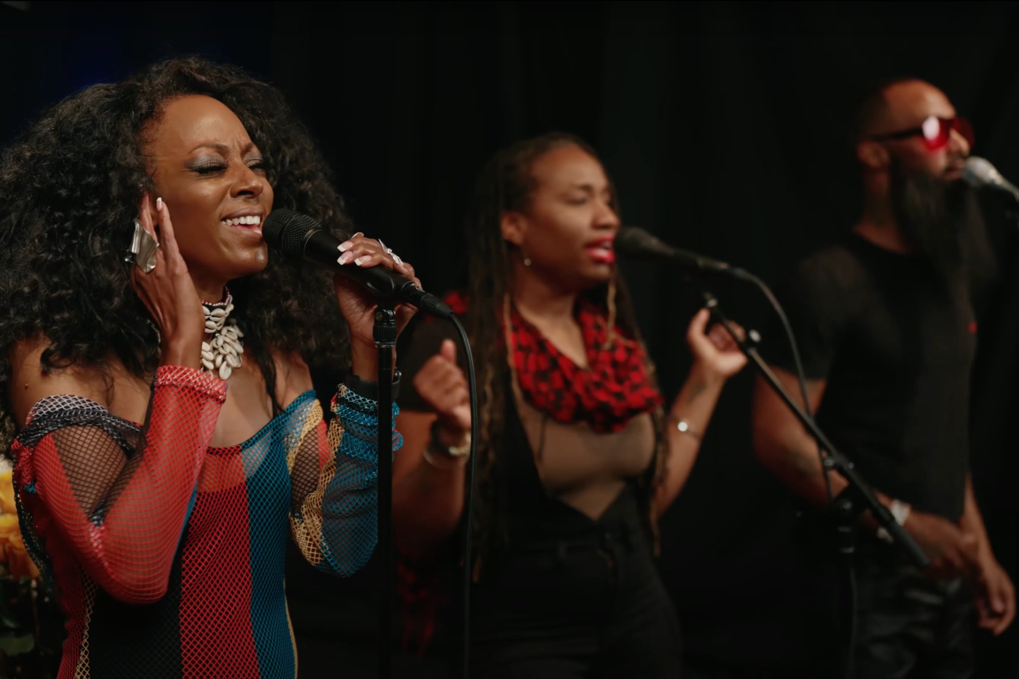Live performers singing on stage at a Maryland party event
