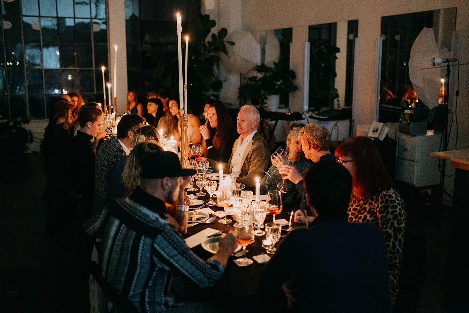 Curated Massachusetts party planners setup with floral centerpieces and warm lighting
