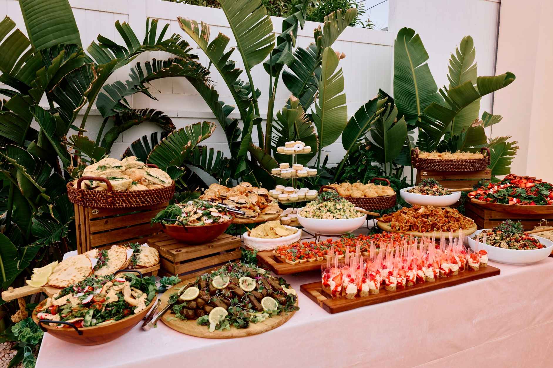 Elaborate tropical catering display with appetizers for a stylish Miami party