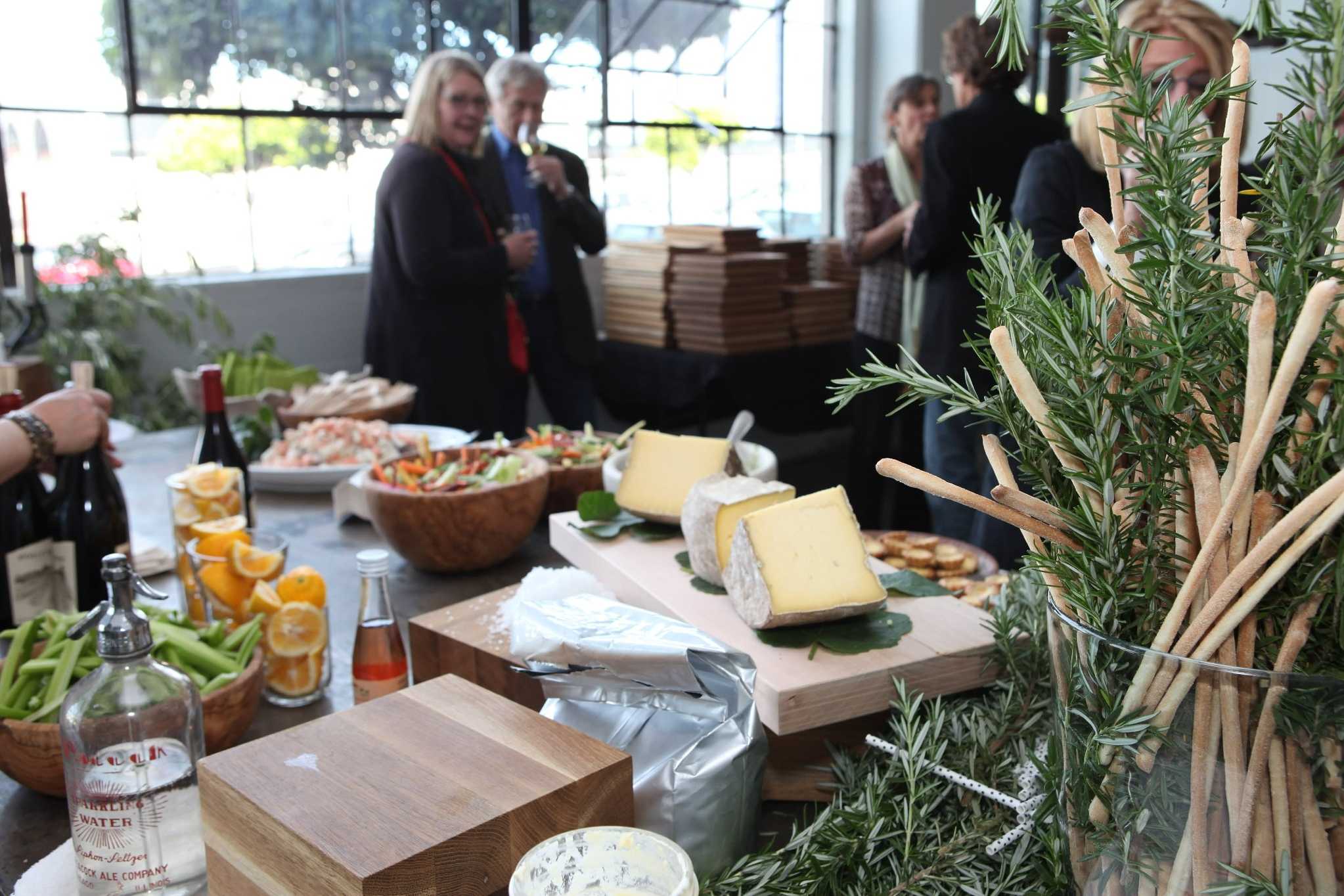 Upscale catering spread with fresh herbs at a Milwaukee party