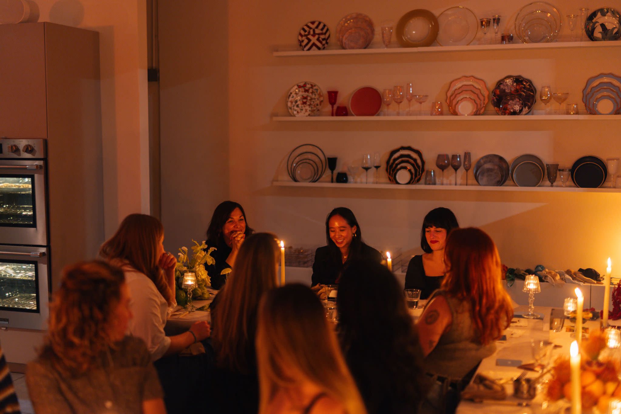 Intimate dinner party gathering around a styled table in Philadelphia