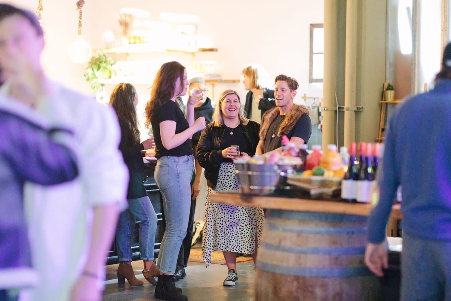 Guests mingling at a modern San Francisco party planning event