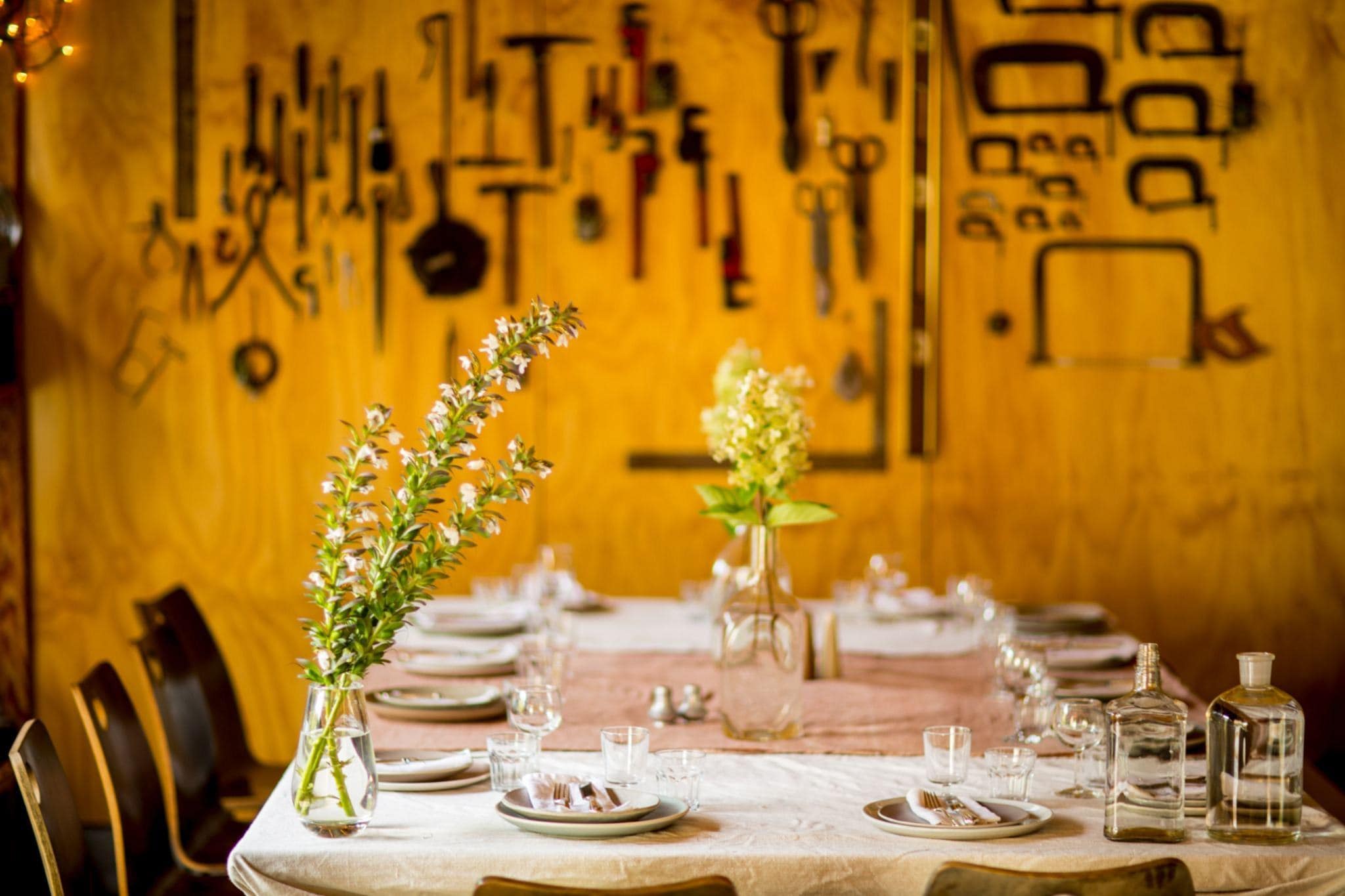 Polished tablescape with floral centerpieces at a Seattle party venue