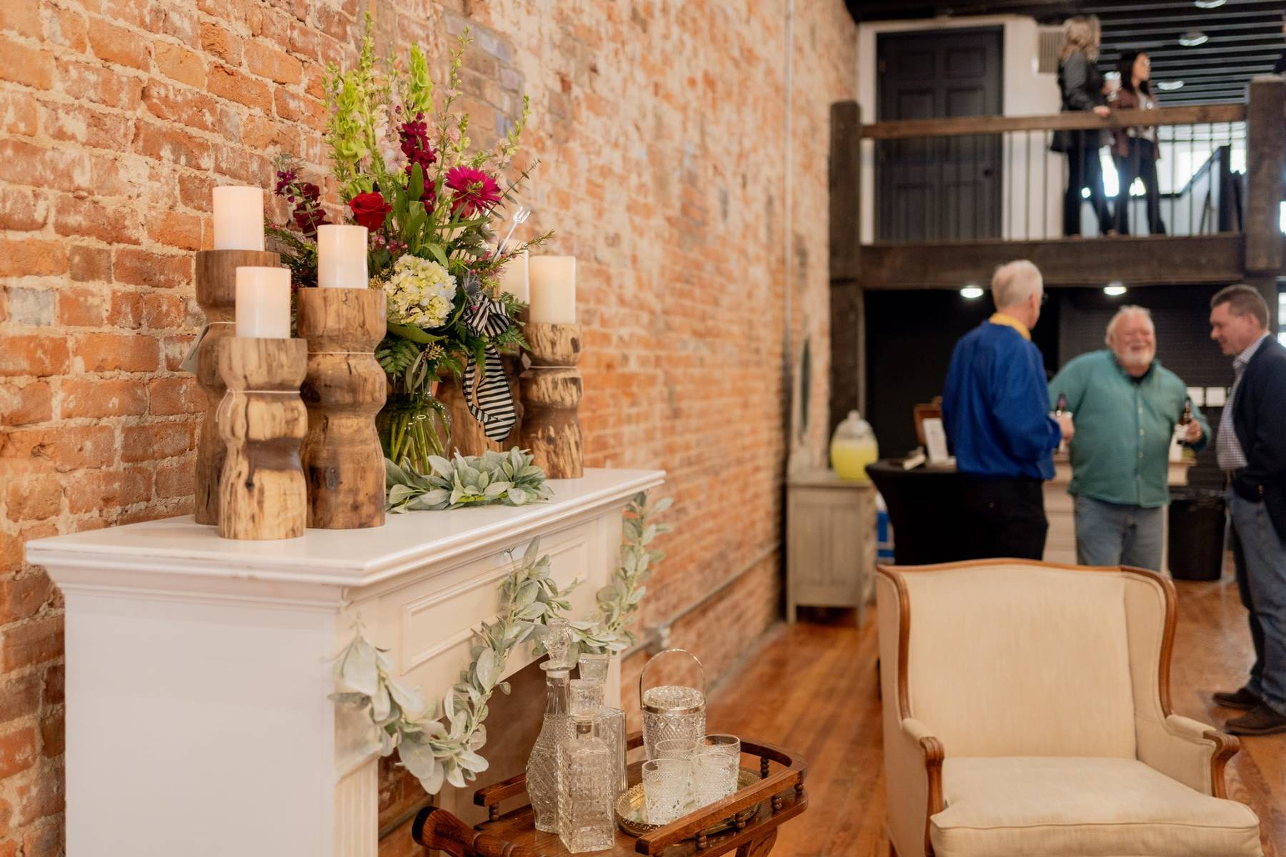 Guests mingling in refined St Louis brick venue