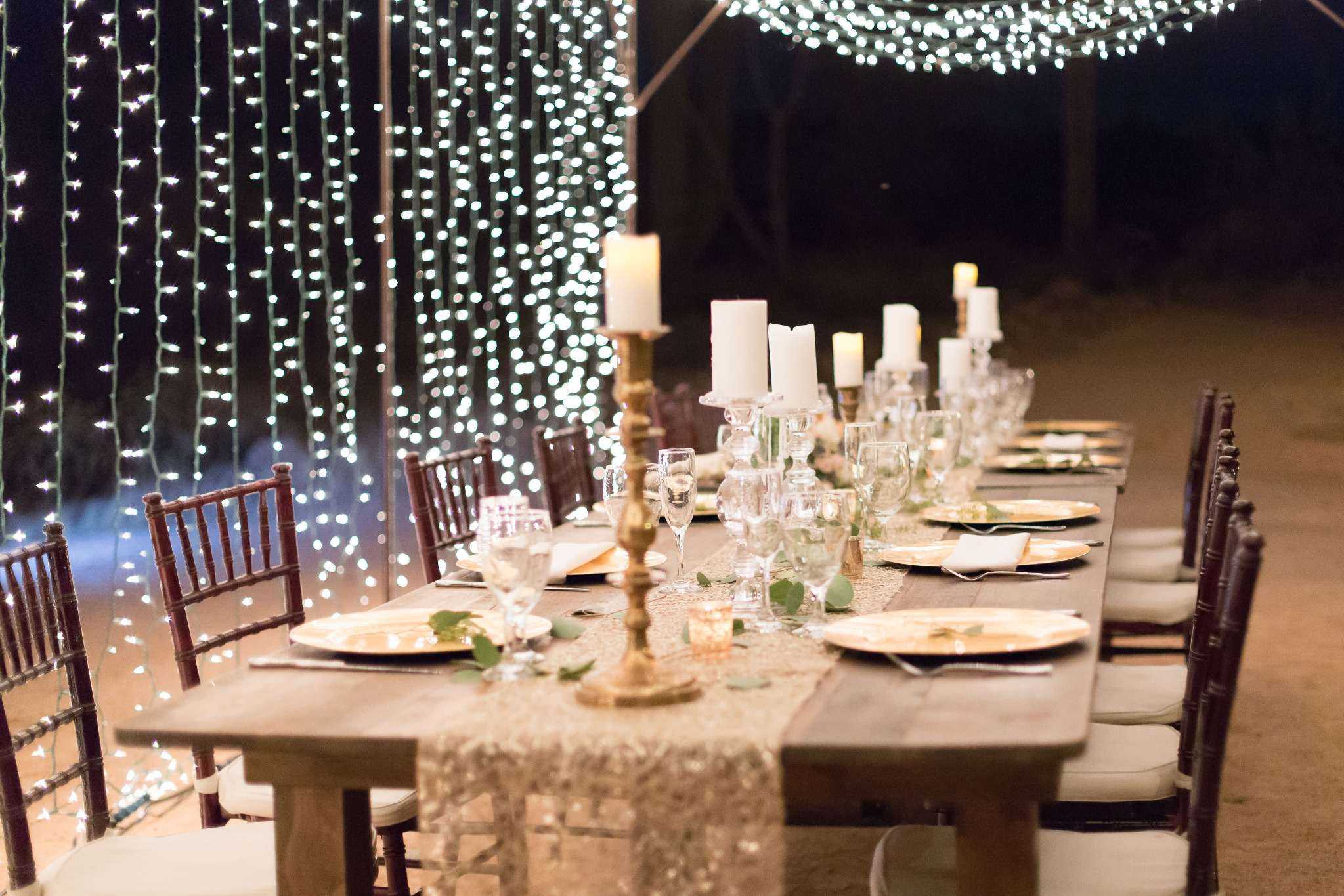 Upscale Tucson party setup with fairy lights and candles