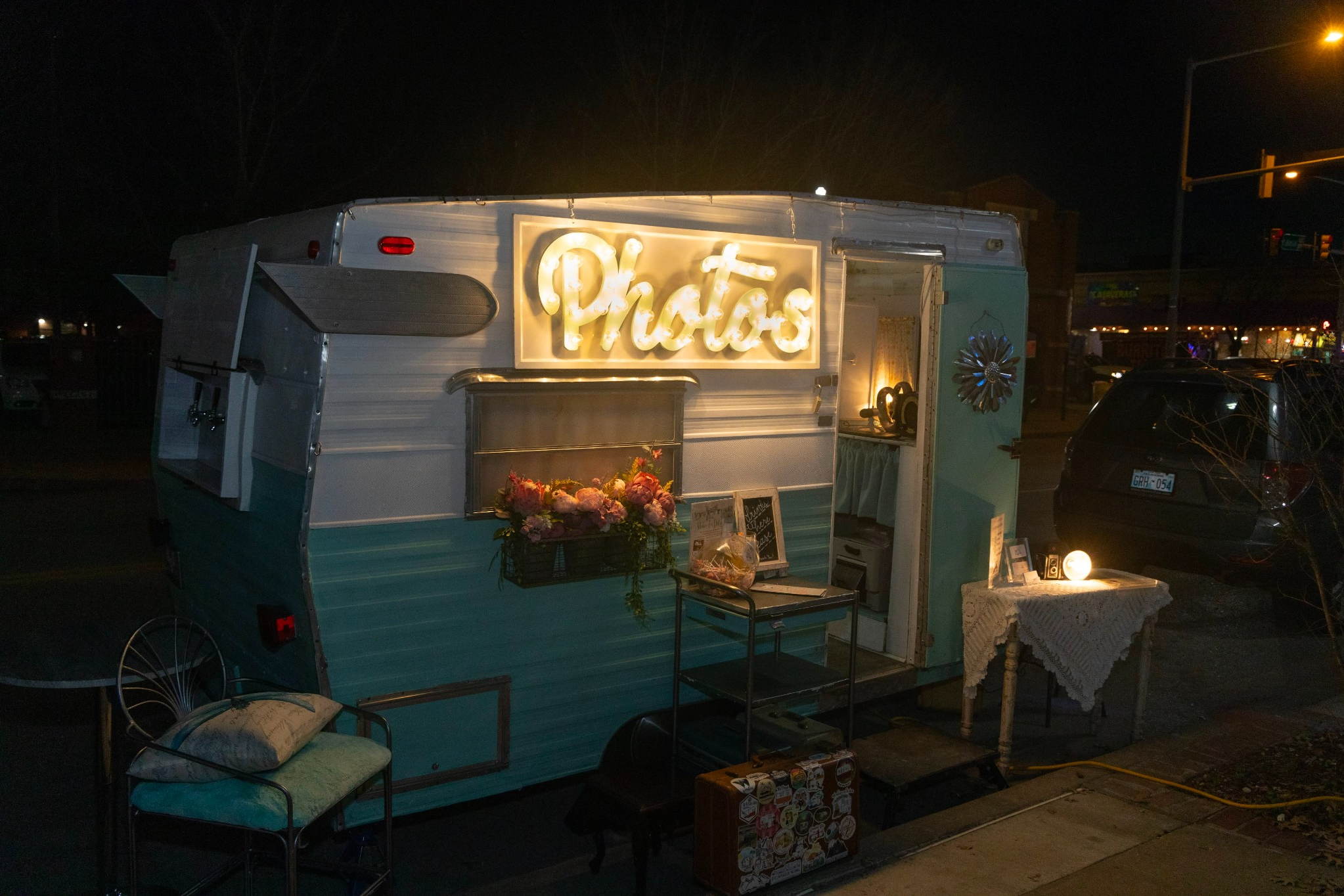 Vintage-style photo booth setup coordinated by Tulsa party planners