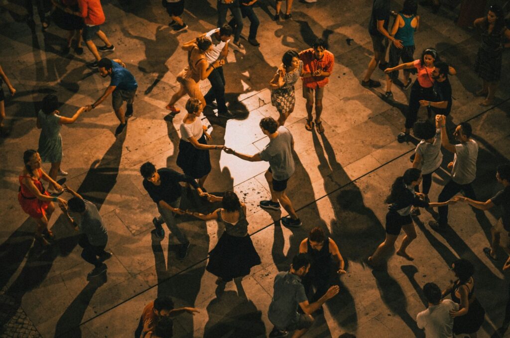 people dancing in a barn