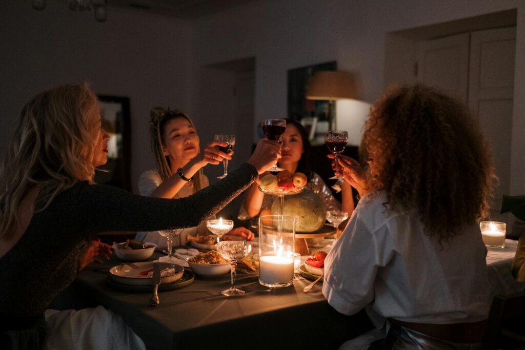 Female friends toasting at a Galentines dinner
