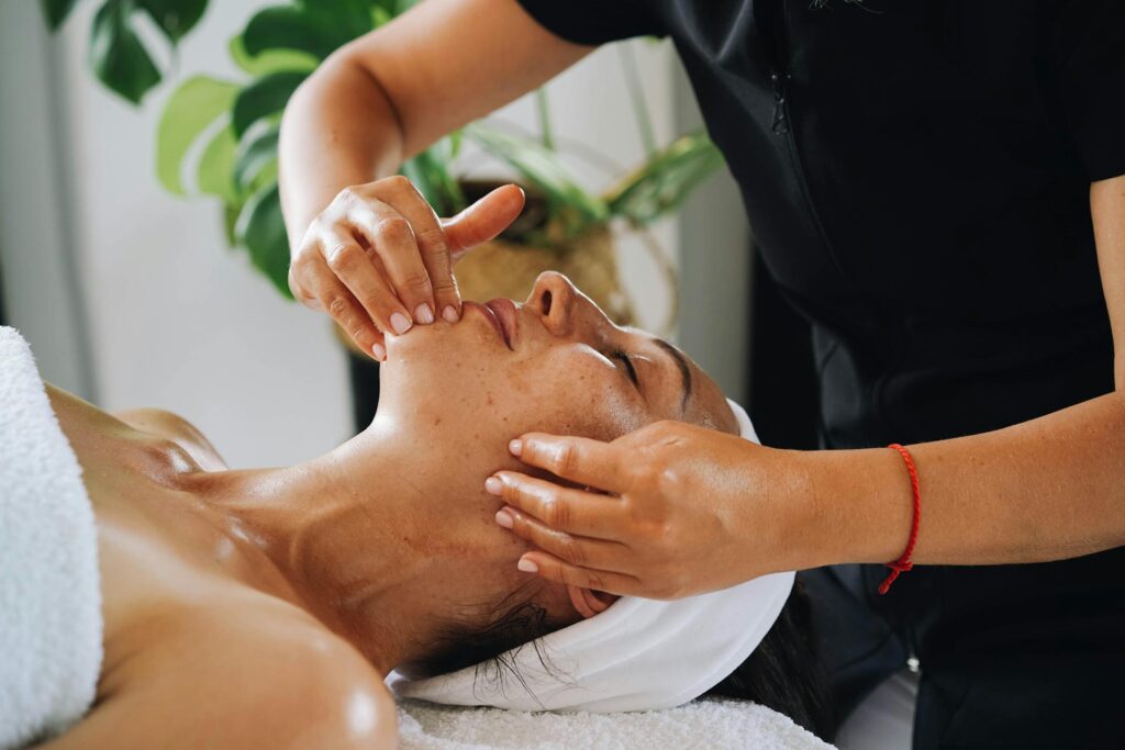 Woman getting a facial massage on her birthday