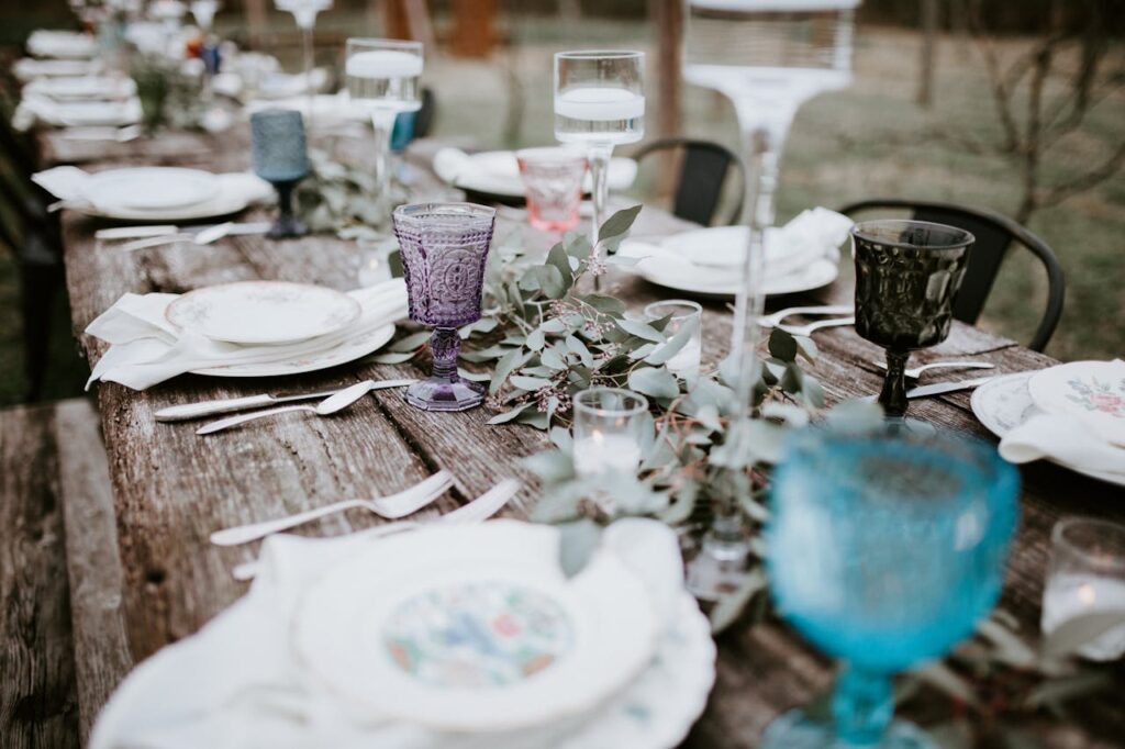 Mismatched table decor for DIY small backyard wedding