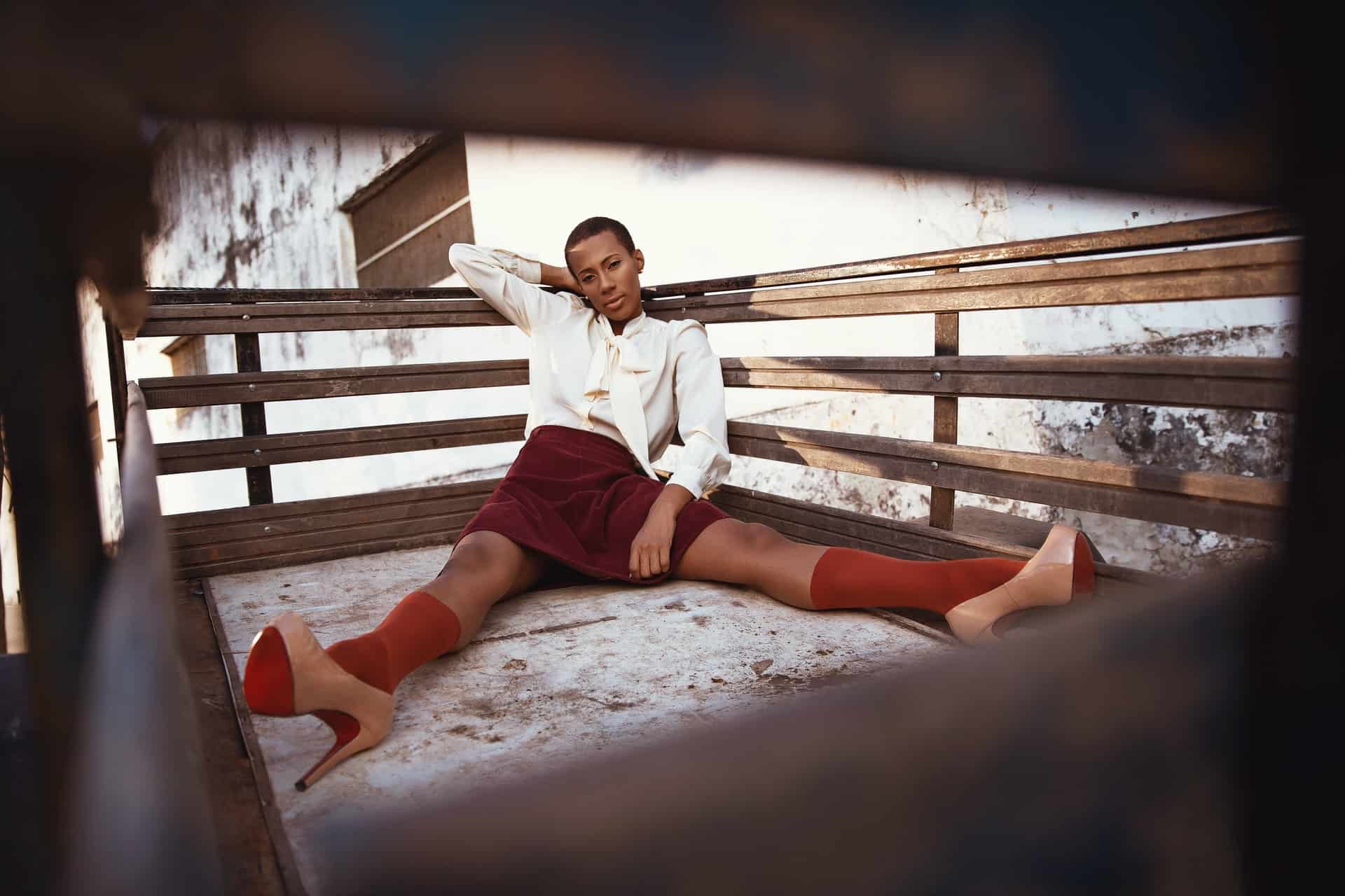 model sitting in back of truck