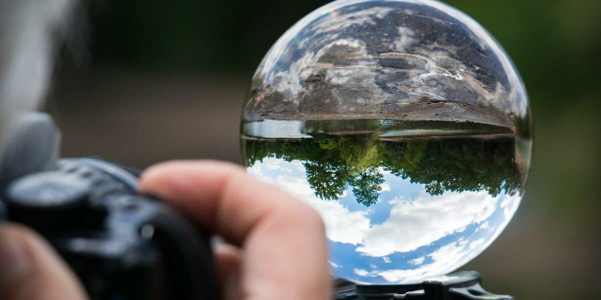 photographer shooting glass ball