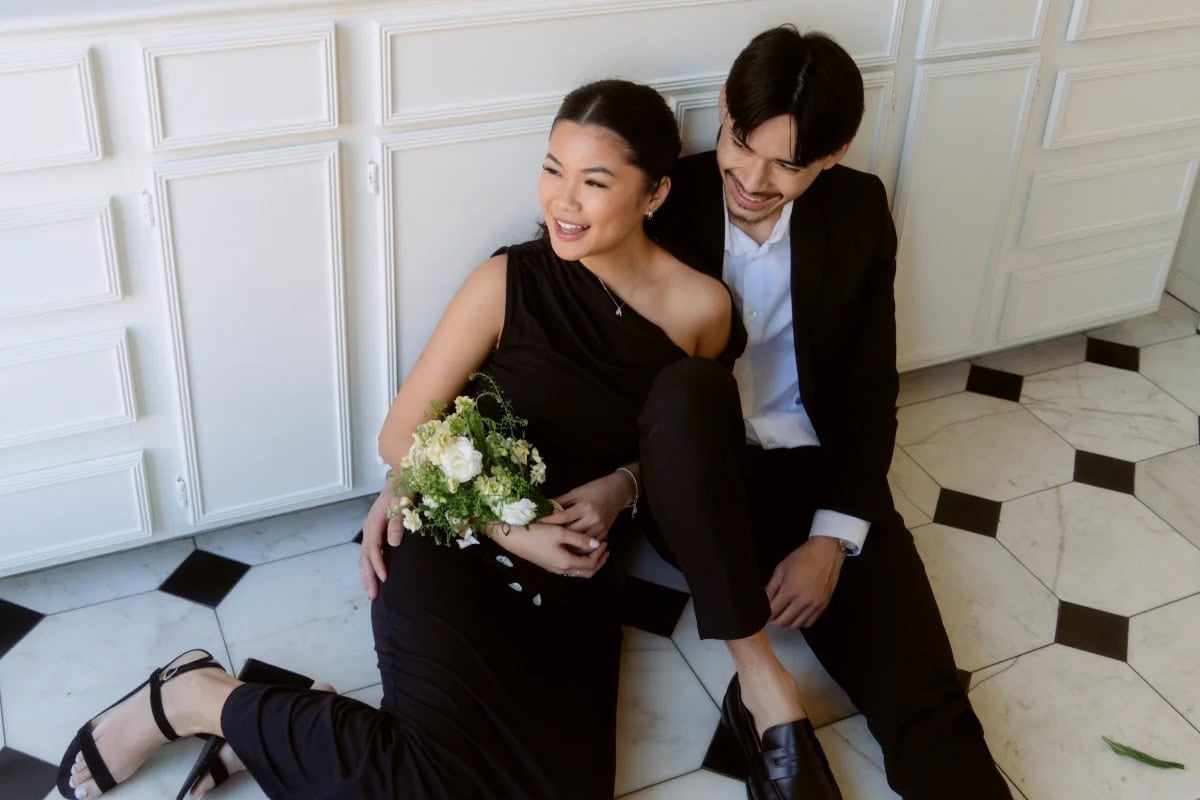 Outdoor Boston proposal styling with candles and florals in park