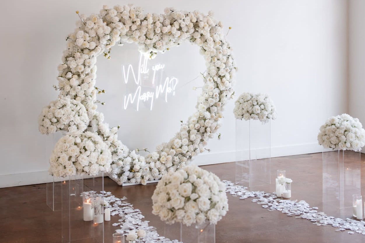 Floral arch and signage from a Kansas City proposal setup