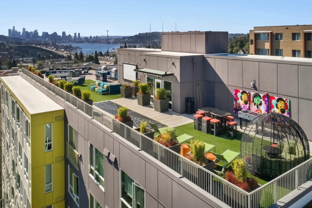 Rooftop event space in Seattle with multiple gathering spaces, games and a view of the city