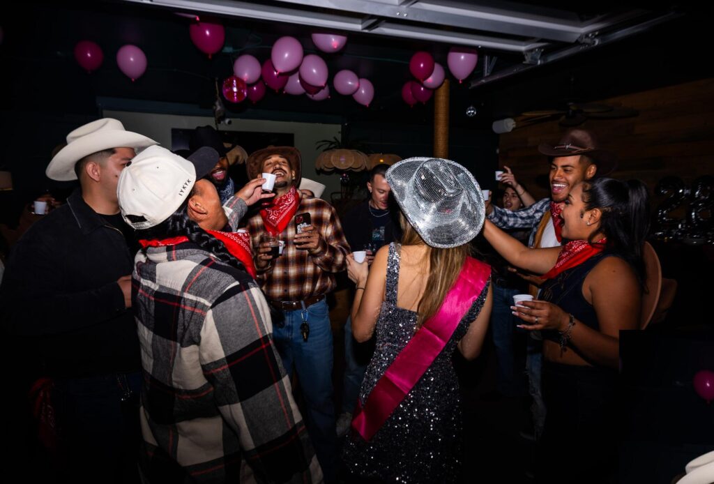 birthday girl and friends gather on a dance floor