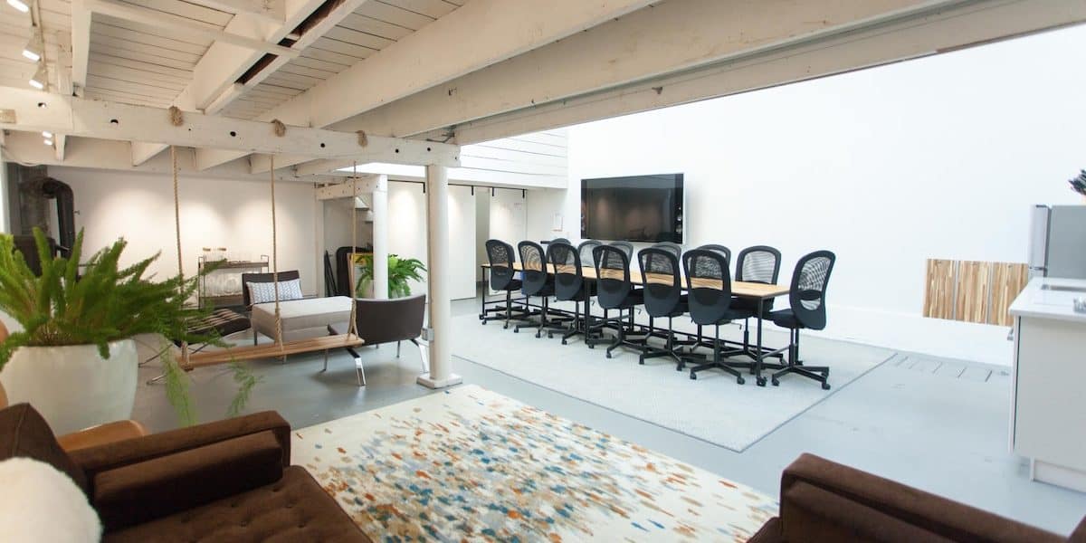 Multipurpose space for rent in San Francisco with conference tables, swing and couch
