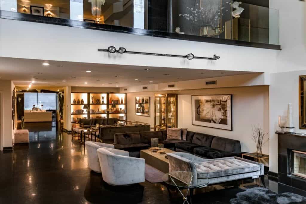 a glamorous modern lounge with plush seating